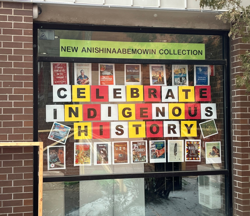 Picture of window display at Spadina Road branch. It features a banner sharing the new Anishinaabemowin Language Collection, as well as a second banner called "Celebrate Indigenous History." Surrounding the second banner are book covers by various Indigenous authors. Picture of window display at Spadina Road branch. It features a banner sharing the new Anishinaabemowin Language Collection, as well as a second banner called "Celebrate Indigenous History." Surrounding the second banner are book covers by various Indigenous authors.