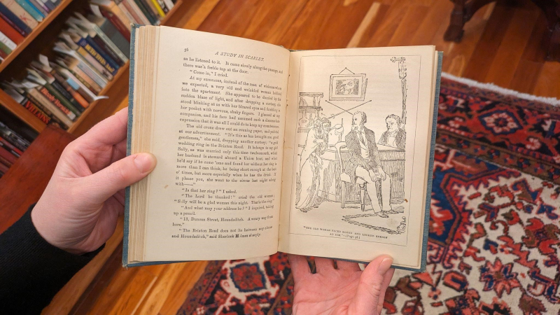 Book opened with text on the left page and illustration on the right page. Book opened with text on the left page and illustration on the right page.