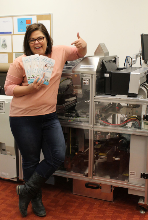 Crystal sees her book for the first time in print