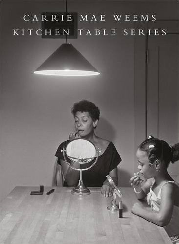 Carrie Mae Weems Kitchen Table Series: 'Kitchen Table Series' is the first publication dedicated solely to this early and important body of work by the American artist Carrie Mae Weems. The 20 photographs and 14 text panels that make up the artwork tell a story of one woman’s life, as conducted in the intimate setting of her kitchen. The kitchen, one of the primary spaces of domesticity and the traditional domain of women, frames her story, revealing to us her relationships--with lovers, children, friends--and her own sense of self, in her varying projections of strength, vulnerability, aloofness, tenderness, and solitude. 'Kitchen Table Series' seeks to reposition and reimagine the possibility of women and the possibility of people of color, and has to do with, in the artist’s words “unrequited love."" 