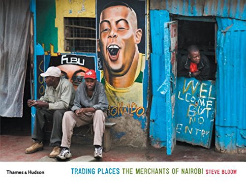 Trading Places The Merchants Of Nairobi: In Nairobi, slick advertising has made few inroads, and shopping malls and supermarkets remain a rarity. People buy their daily necessities locally, from small traders within their communities. Business owners paint their own billboards and signs, or call in friends who happen to be handy with a paintbrush. The results are delightfully quirky—an authentic form of popular street graphics that is endlessly fascinating.“Beauty is your birthright” proclaims the Eclipse Hair Salon. The Enlightened Electricals store features paintings of bulbs, switches, sockets, and plugs. More than one shack hotel sports the name “Hotel Hilton,” while elsewhere “Joy Hotel” is scrawled in white paint across corrugated metal panels.
“Ghetto life is not easy” says the facade of the Abdalla Store. Indeed not: these are people for whom the threat of hunger is never far away, and money is a constant preoccupation. Yet in poignant and frank interviews with Steve Bloom, Kenyans display extraordinary generosity: their priorities are faith, family, love, community, and helping others.