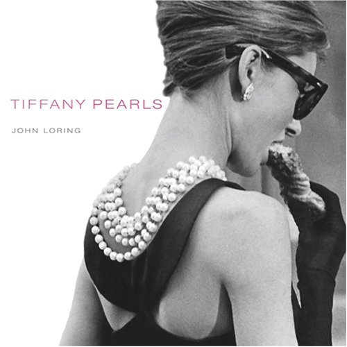 Tiffany pearls: Tiffany Pearls, the latest in Abrams' line of books for and about Tiffany & Co., tells the dazzling history of pearl jewellery at Tiffany, from the mid 19th century to the present. Long cherished as symbols of purity and perfection and assoicated with elegance and affluence, pearls are among the most coveted of all gemstones, and those designed by Tiffany are among the finest. Tiffany Pearls is lavishly illustrated with archival photographs, paintings of famous pearl lovers throughout history (including Queen Elizabeth I, Catherine de Medici and Mary Todd Lincoln), sketches and drawing of Tiffany's designs and contemporary photography of their spectacular pearl pieces.