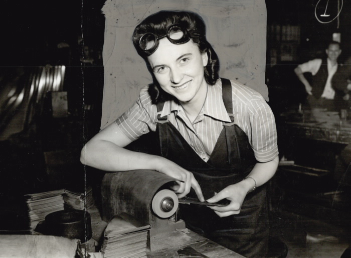 1941 photo of woman at grinding wheel
