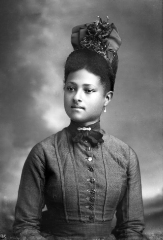 Photo of stylish young black woman with hat by Alvan S. Harper circa 1890s