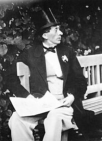H.C. Andersen in top hat seated on a bench near Copenhagen 1869 H.C. Andersen in top hat seated on a bench near Copenhagen 1869