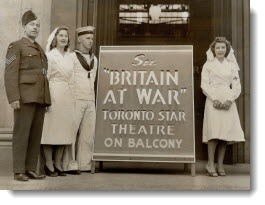 C.N.E. Crowds see first showing of Britain at war