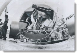 Taking a spin on one of the many rides at the CNE are three of the thousands of children visiting the Ex today on Children's Day