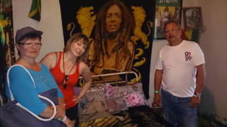 Image of Emoke and paren'ts in Bob Marley's room Image of Emoke and paren'ts in Bob Marley's room