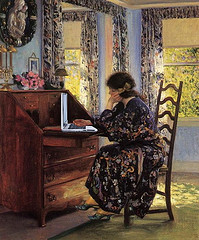 Woman sitting on a chair in front of a laptop- Guy Orlando Rose painting