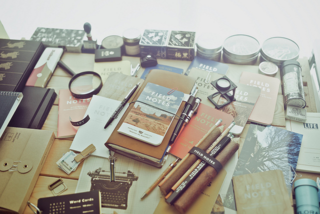 Notebooks and pens on a desk
