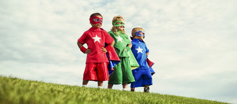 Kids in superhero costumes