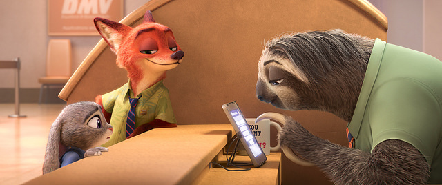 Flash the sloth working at the DMV in the Zootopia trailer.