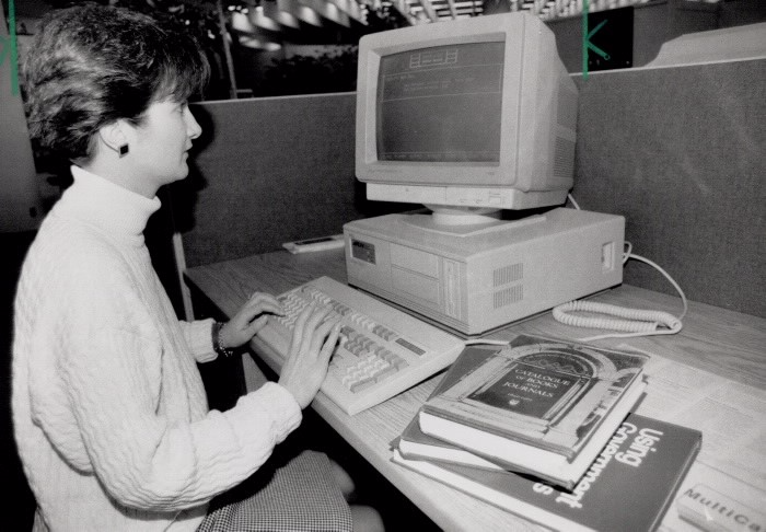 Karie Kerr looking up resources on MTL’s staff only catalogue computers