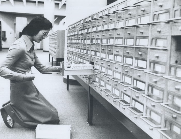 Staff sorting through the card catalog at the Metro Toronto Library in 1977.