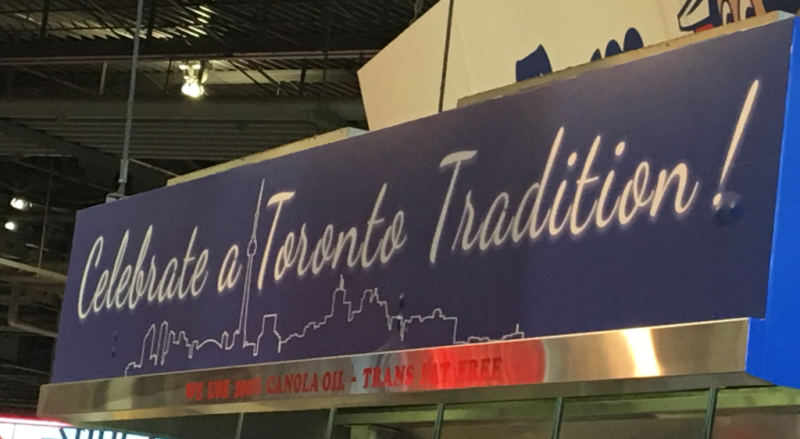 Tiny Tom Donut Sign from the CNE Food Building which reads "Celebrate a Toronto Tradition!"