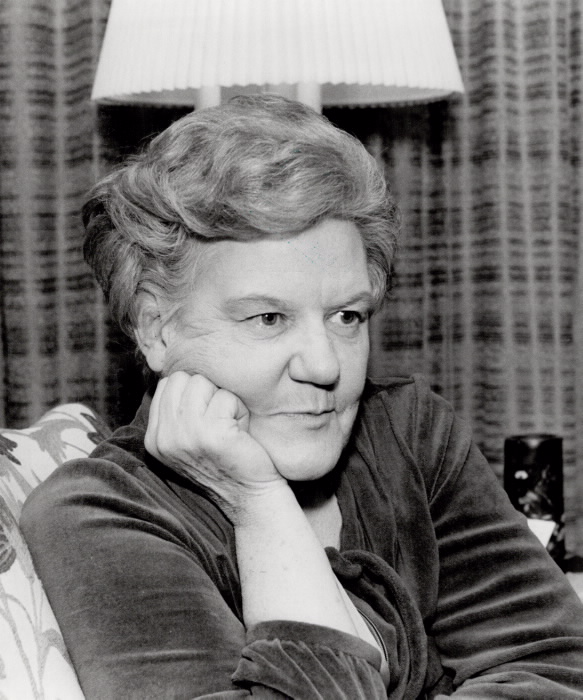 Portrait of Grace Hartman posing inside a room