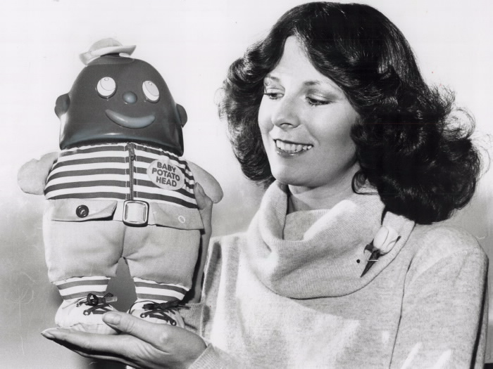 Toy with potato head held by a woman