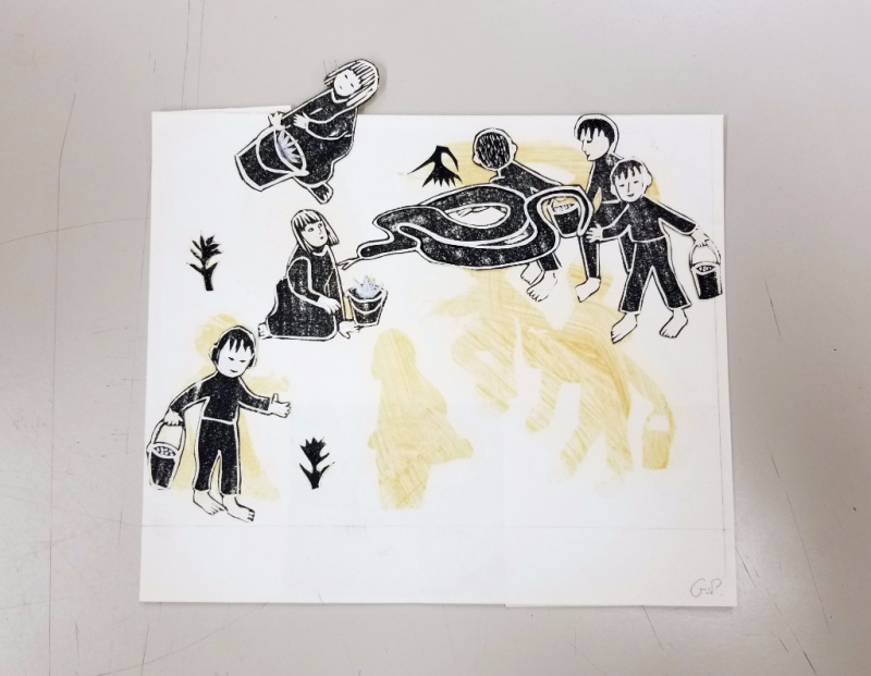 Cut outs of figures detached from piece of paper with residue of adhesive