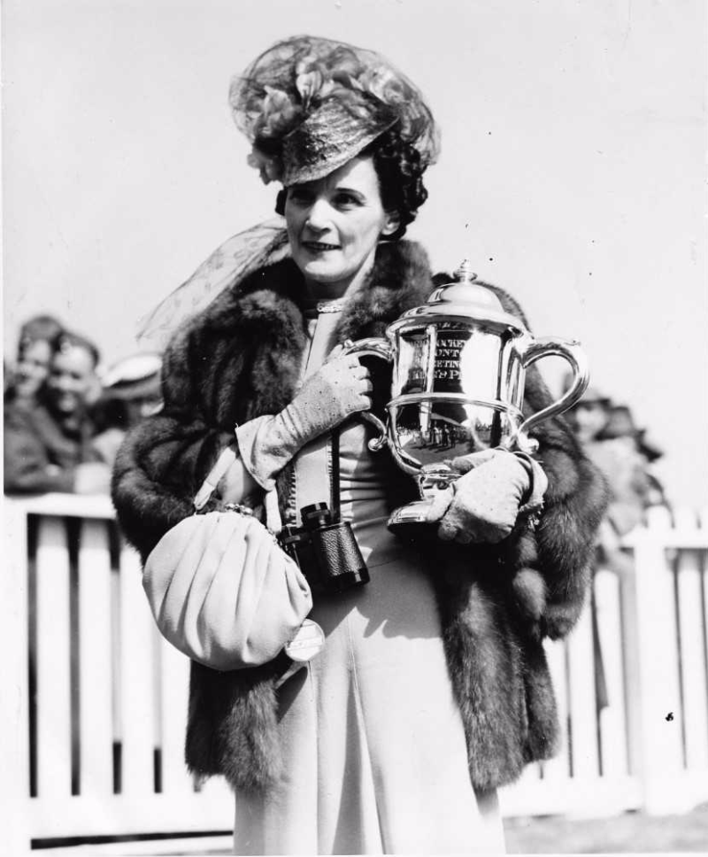 Mildred Kane holding trophy