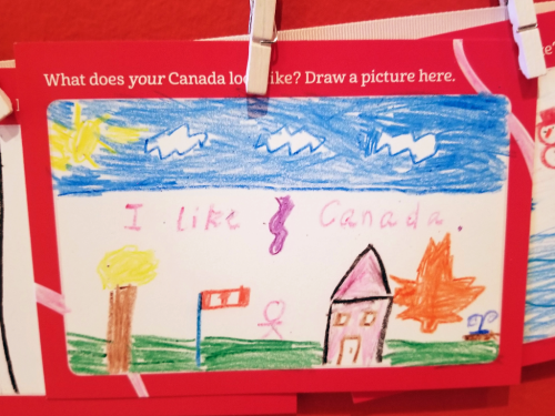 Crayong drawing of outdoor scene with tree canadian flag house and blue sky and the words I like Canada Crayong drawing of outdoor scene with tree canadian flag house and blue sky and the words I like Canada