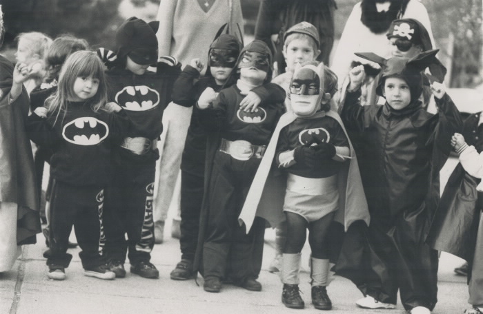Group of children wearing Halloween costumes