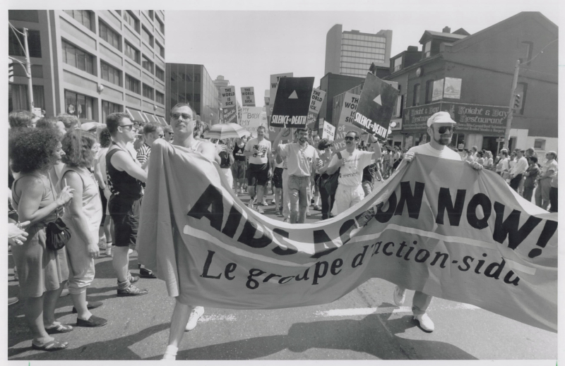 Members of the AIDS Action Now! organization holding a banner at the 1989 Toronto Pride Parade