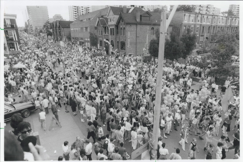 Thousands of people crowd the streets at Church and Wellesley in Toronto for the 1987 Pride Parade