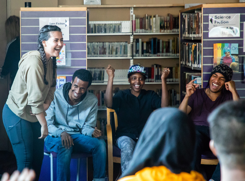 Participants Laughing at the Poetry Saved Our Lives Final Slam