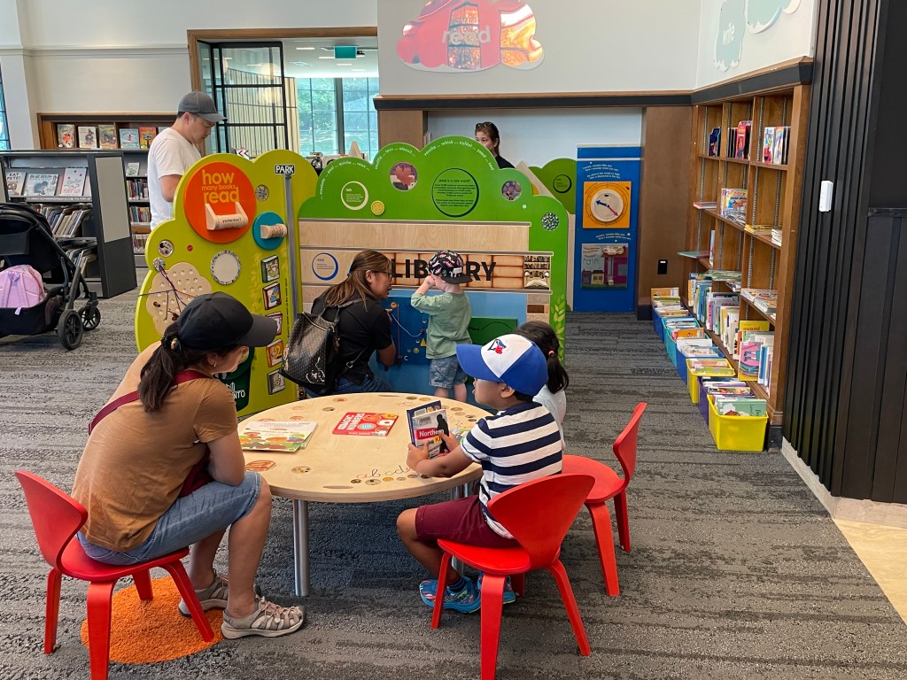 Families enjoying the KidsStop at the newly renovated Locke branch