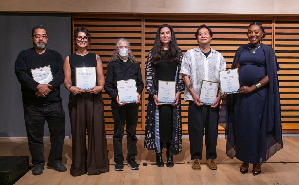 The 2025 Toronto Book Awards finalists and winner (L-R) André Alexis, Roza Nozari, Maggie Helwig, Tanya Talaga, Vinh Nguyen and Dr. Chika Stacy Oriuwa